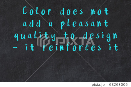 Chalk inscription of smart quote on black desk 68263006