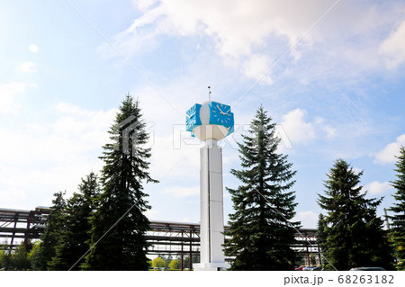 Unusual clock on a background of a white-blue sky 68263182