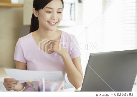 Business woman working at home Business woman working at home 68263592