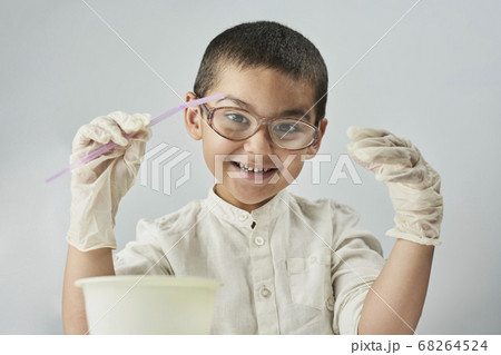 Funny nerd kid in glasses the world of chemistry 68264524