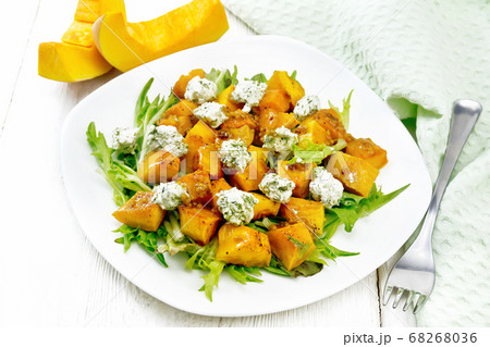 Salad of pumpkin and cheese in plate 68268036