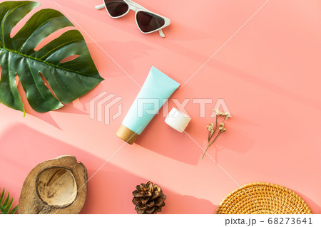 Blue bottle cream, mockup of beauty product brand. Top view on the pink background. Blue bottle cream, mockup of beauty product brand. Top view on the pink background. 68273641