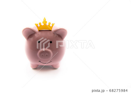 Pink piggy bank with golden crown isolated over 68275984