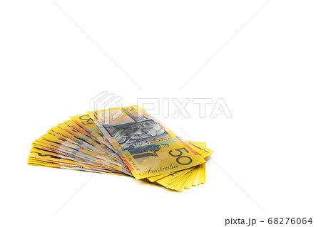 Stack of Australian 50 dollars banknotes isolated Stack of Australian 50 dollars banknotes isolated 68276064