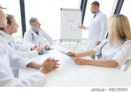 Doctors discuss mental health concept Doctors discuss mental health concept 68278503