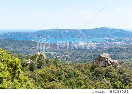 Landscape shot with green forests, mountains and a 68283521