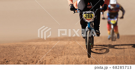 BMX riders competing in the child class on the off-road circuit BMX riders competing in the child class on the off-road circuit 68285713