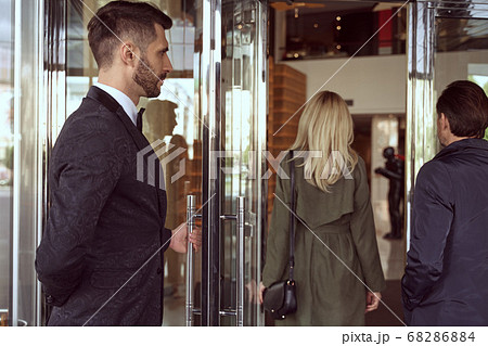 Porter is a first person to greet guests at a hotel 68286884