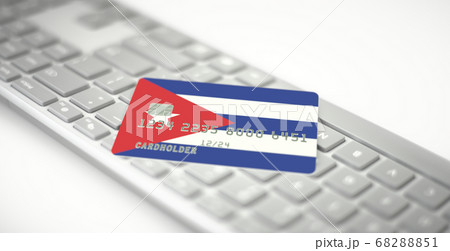 Bank card depicting flag of Cuba on computer keyboard. Fictional numbers Bank card depicting flag of Cuba on computer keyboard. Fictional numbers 68288851