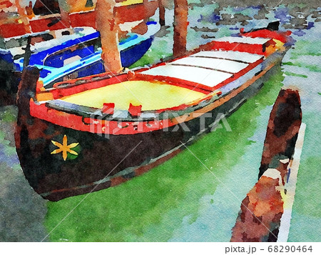 a small colored gondola parked beside one of the canals of Venice a small colored gondola parked beside one of the canals of Venice 68290464