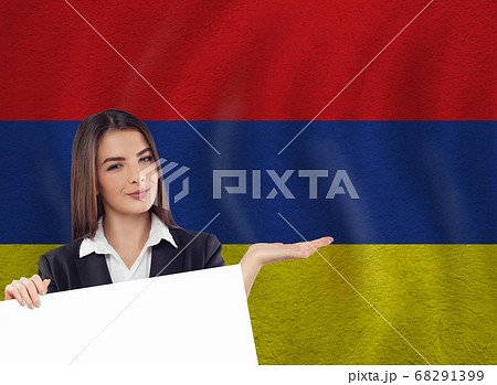 Young woman with white banner and national flag Young woman with white banner and national flag 68291399