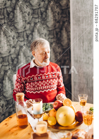 attractive old man remembers his wife during th holiday attractive old man remembers his wife during th holiday 68291707