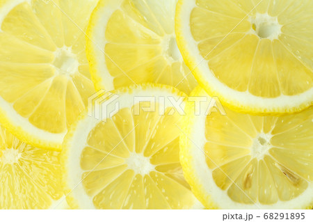 Background from bright juicy sliced lemon slices. Background from bright juicy sliced lemon slices. 68291895