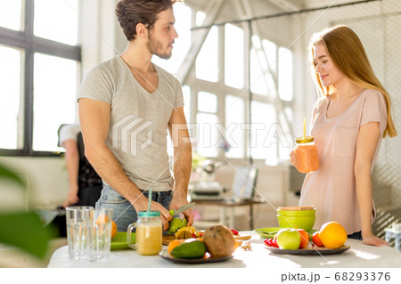 young husband is looking after his pregnant wife young husband is looking after his pregnant wife 68293376