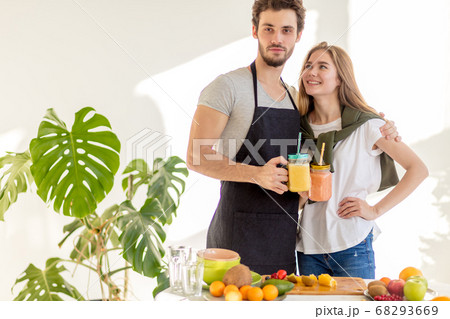 pleasant fair-haired girl is looking at her boyfriend pleasant fair-haired girl is looking at her boyfriend 68293669