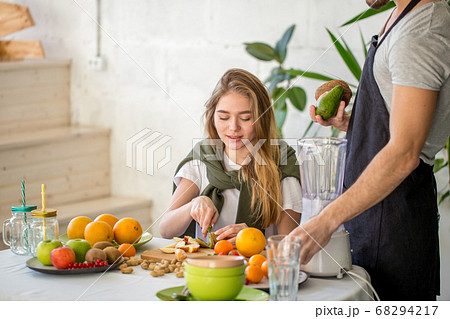 young blond girl taking part in a cooking competition young blond girl taking part in a cooking competition 68294217