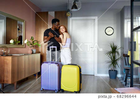 cute couple enter new apartment cute couple enter new apartment 68296644