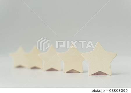 Wooden five star shape on white background 68303096