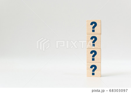 Wooden cube block shape with sign question mark 68303097