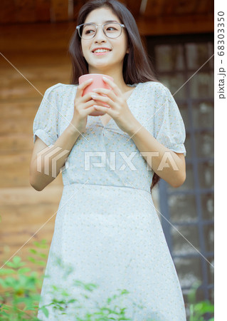 joyful woman welcomes the new day 68303350