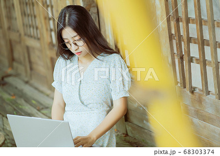 the woman is working 68303374