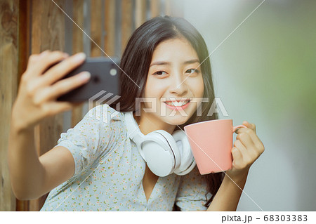 woman is taking a selfie 68303383