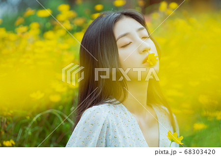 woman in the flower garden woman in the flower garden 68303420