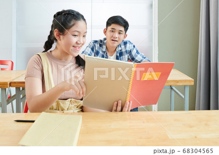 Schoolgirl sharing test answers Schoolgirl sharing test answers 68304565