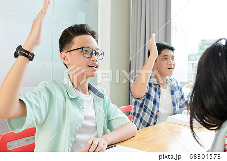 Students raising hands Students raising hands 68304573