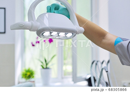 Dental chair led lamp, close-up modern medical professional equipment in dentist office 68305866
