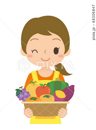 おいしそうな野菜や果物を持っているお母さん さつまいも かぼちゃ りんご 梨 ぶどう 柿 イラストのイラスト素材