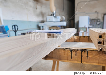 Background carpentry woodworking woodshop, machines and tools, wooden boards Background carpentry woodworking woodshop, machines and tools, wooden boards 68307777