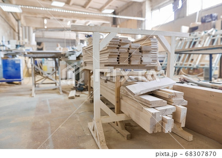Background carpentry woodworking woodshop, machines and tools, wooden boards 68307870