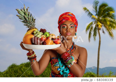 Portrait of a sweet Black Woman with a tray of Portrait of a sweet Black Woman with a tray of 68308339