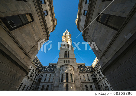 Uprisen angle of Philadelphia city hall with historic building over blue sky background, Pennsylvania, USA or United States of America, Architecture and building, Travel and Tourism concept Uprisen angle of Philadelphia city hall with historic building over blue sky background, Pennsylvania, USA or United States of America, Architecture and building, Travel and Tourism concept 68308896