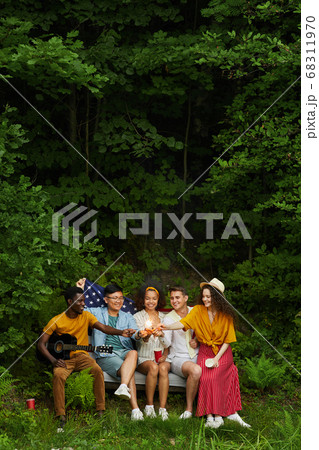 Friends Enjoying Time Outdoors 68311970