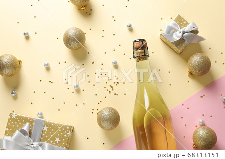 Champagne bottle and christmas baubles on two tone Champagne bottle and christmas baubles on two tone 68313151