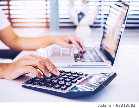 Asian Thai women work at home with laptops 68313682