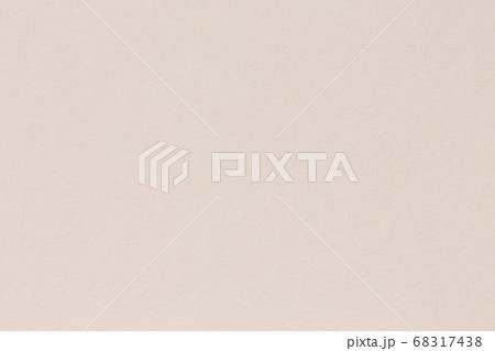 Paper texture background in light cream tone, macrp shot. Paper texture background in light cream tone, macrp shot. 68317438
