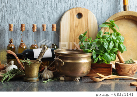 Vintage kitchen utensils with bottles of olive Vintage kitchen utensils with bottles of olive 68321141