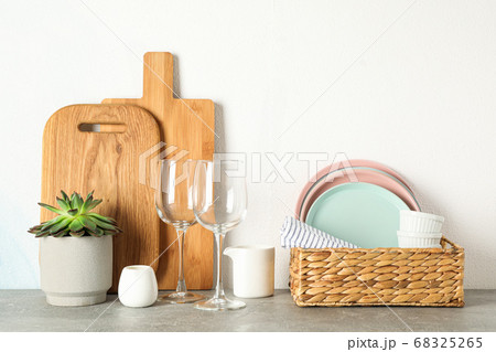 Set of dinnerware with succulent plant on grey 68325265