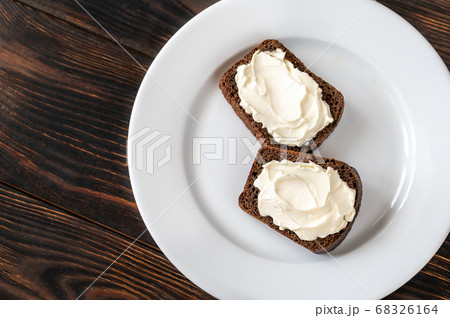 Slices of rye bread with cream cheese Slices of rye bread with cream cheese 68326164