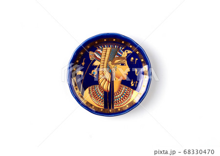 Plate with ancient egyptian god image. 68330470