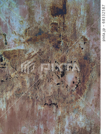 Rusty metal background with streaks of rust. Rusty metal background with streaks of rust. 68332587