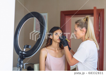 Makeup woman artist at work, professional in Makeup woman artist at work, professional in 68332831