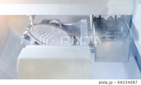 Dental milling made with modern equipment of a zirconia. Dental milling made with modern equipment of a zirconia. 68334087