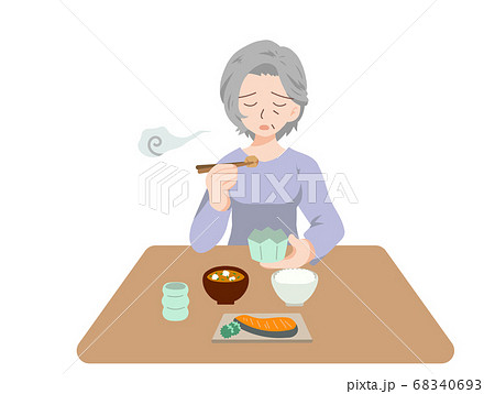 一人で食事をするさみしい高齢者のイラストのイラスト素材