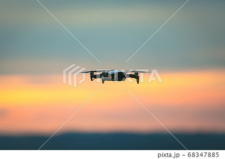 Drone pilotage on the sky at sunset. Drone pilotage on the sky at sunset. 68347885