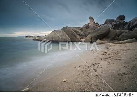The scenery of the long-exposure of Hinta or Grandfather rocks of Lamai beach in Samui, Surat Thani 68349787