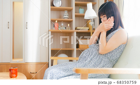 頬を抑える妊婦　虫歯など　16:9 68350759
